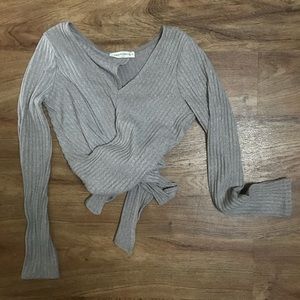 Taupe colored long sleeve crop sweater